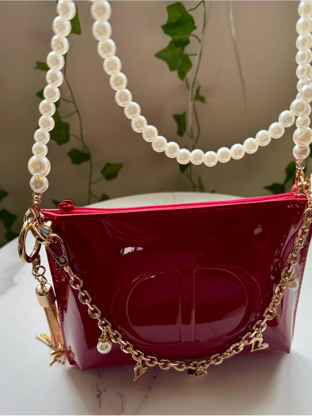 Dior Red Patent cosmetic pouch with gold hardware